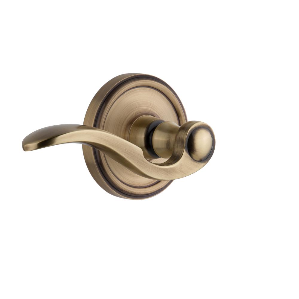 Grandeur by Nostalgic Warehouse GEOBEL Privacy Right Handed Knob - Georgetown Rosette with Bellagio Lever in Vintage Brass